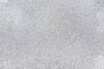 Glitter background silver shiny christmas background. Glitter vintage lights background. silver and...