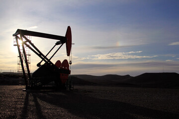 pumping unit, backlighting, sunset