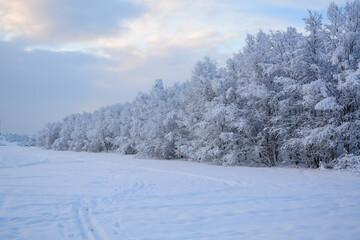 MURMANSK, RUSSIA - FEBRUARY 10, 2021: Semonovskoye lake covered by snow in winter