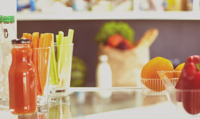 Open fridge full of fresh fruits and vegetables, healthy food background, organic nutrition