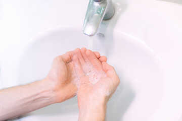 Corona virus travel prevention man showing hand hygiene washing