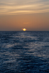 Beautiful seascape - waves and sky with clouds with beautiful lighting. Golden hour. Sunset at sea.