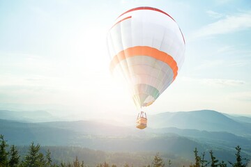 Fototapeta premium balloon in the clouds of sunrise
