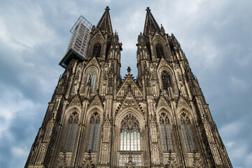Fototapeta na wymiar Cologne, Germany - June 05, 2021. Facade of the Cathedral Church of Saint Peter, Catholic cathedral in Cologne