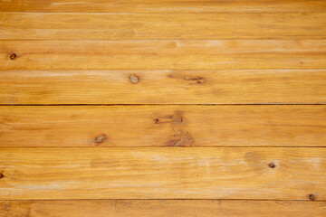 Fototapeta na wymiar Nice table top made of horizontal wooden planks varnished with worn yellow tones. Vector wood texture.