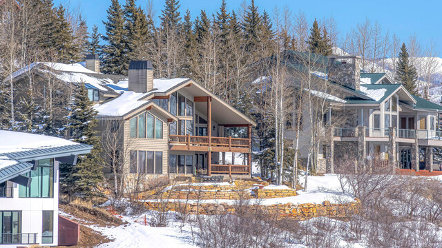 Pano Houses Amidst Evergreens In Park City Utah Mountain On A Scenic Winter Setting