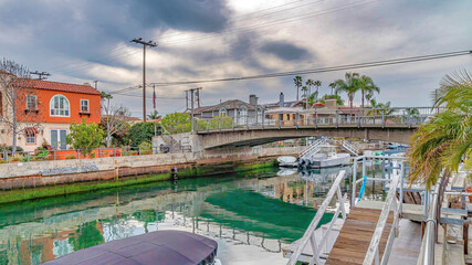 Pano Beautiful canal with walkways and footbridge in scenic Long Beach California