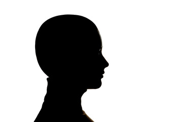 Dark silhouette of a woman on white background close-up.