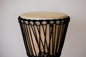 A djembe or jembe is a rope tuned skin covered goblet drum played with bare hands is a percussion...