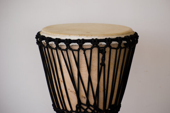 A djembe or jembe is a rope tuned skin covered goblet drum played with bare hands is a percussion instrument orginally from West Africa