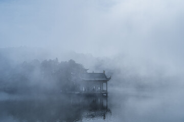 Fototapeta na wymiar lushan traditional pavilion in mist