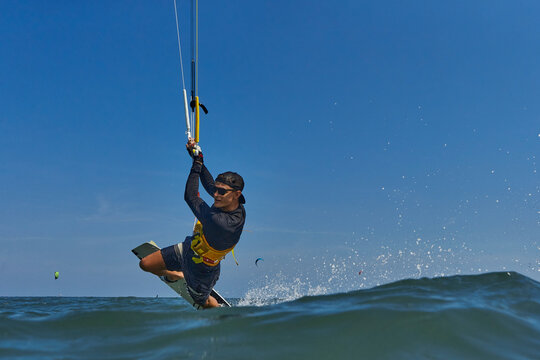 Kite surfer riding a kiteboard