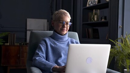 Psychotherapist helps patients online woman uses laptop Akspb