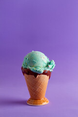 blue ice cream cup, purple background.