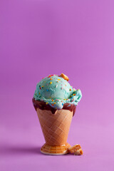 blue ice cream cup, purple background.