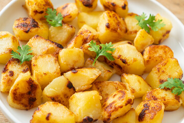 Roasted or grilled potatoes  on plate