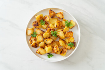 Roasted or grilled potatoes  on plate