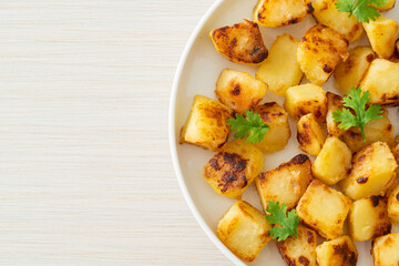 Roasted or grilled potatoes  on plate