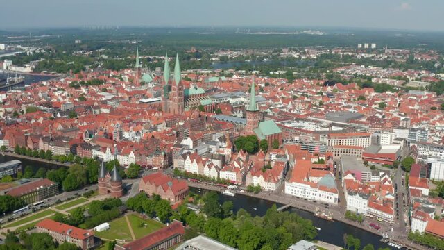 Aerial panoramic view of medieval city centre. Historic brick buildings are part of UNESCO world heritage site. Luebeck, Schleswig-Holstein, Germany
