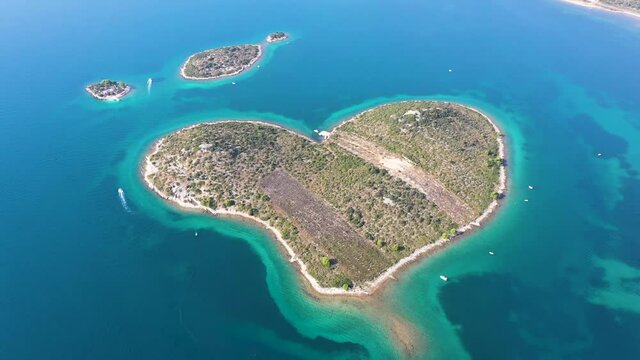 Aerial view of  the beautiful Gale&scaron;njak, Island of Love, Lover's Island, Otok za Zaljubljene, Love Island, Heart shaped Island in the Adriatic Sea in Croatia. Drone shot.
