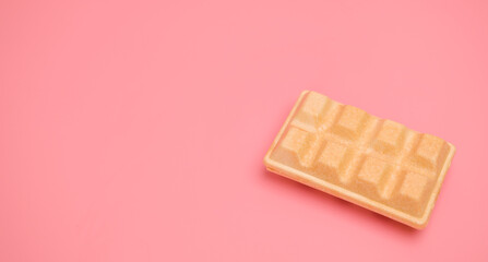 Waffle isolated on pink background, Top view Blank for design.