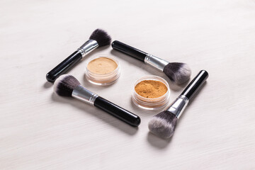 Mineral face powder and brush. Eco-friendly and organic beauty products