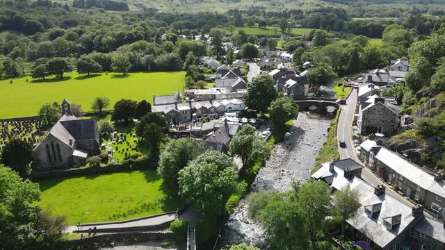 Beddgelert village centre and church  in Snowdonia Wales UK drone  footage 4K.