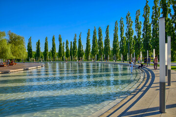 Pond with a tree alley in Galitsky park in Krasnodar city