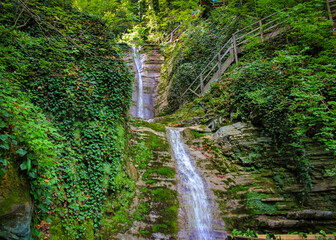 Fototapeta na wymiar Ashe beautiful waterfall in the mountains, Krasnodar region
