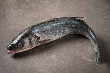 raw fish on the stone background