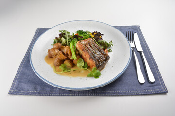 pan fried bbq fresh cod, salmon, grouper fish fillet in chef sauce with potato, corn and vegetables western halal menu