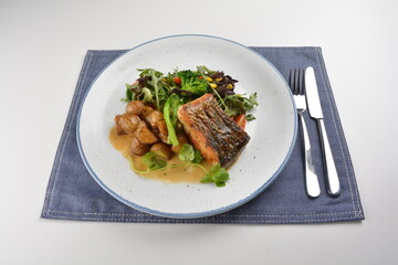 pan fried bbq fresh cod, salmon, grouper fish fillet in chef sauce with potato, corn and vegetables western halal menu