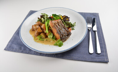 pan fried bbq fresh cod, salmon, grouper fish fillet in chef sauce with potato, corn and vegetables western halal menu