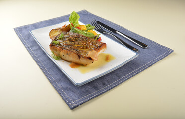 pan fried bbq fresh cod, salmon, grouper fish fillet in chef sauce with potato, corn and vegetables western halal menu