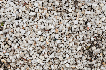 White pebble close up image, stone texture background.