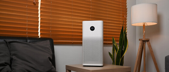 Air purifier for filter and cleaning removing dust in home. Healthy life concept.