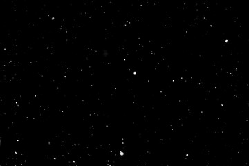 Falling white snow on black background, overlay layer