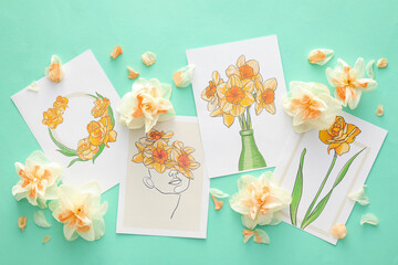 Beautiful greeting cards and narcissus flowers on color background