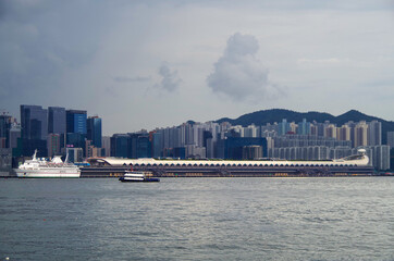 Cruiseship cruise ship liner in port of Hongkong Hong Kong, China with Kai Tak cruise terminal and...