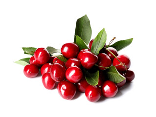 Heap of tasty ripe cherry and leaves on white background