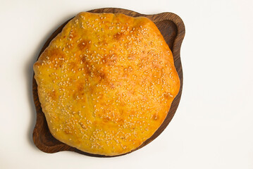 Vanilla cream dessert with sour cream and fresh organic strawberry. Served in a traditional bowl.