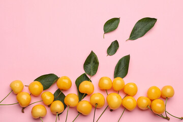 Tasty sweet cherries on color background