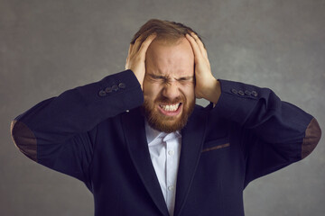 Stop. Don't want to hear it. Won't listen to you. Stressed angry obstinate headstrong exasperated...