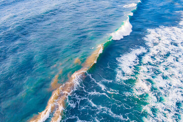 Aerial top view sea amazing nature background. Turquoise and clear water of ocean at sunny day