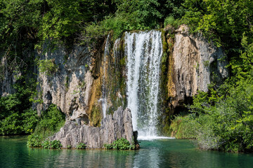 Obraz na płótnie Canvas Waterfall with turquoise water in the Plitvice Lakes National Park, Croatia.