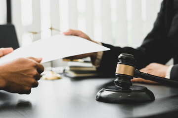 Consulting and finding a solution Concept, businesspeople consult with a lawyer or judge to find out about business fraud.