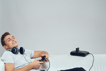 man in white t-shirt with gamepad console entertainment lifestyle
