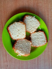 several slices of bread on a wooden table background