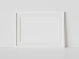 White frame leaning on white floor in interior mockup. Template of a picture framed on a wall 3D rendering