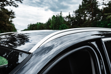 Roof of a black car.